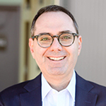 Headshot of David Battat. 