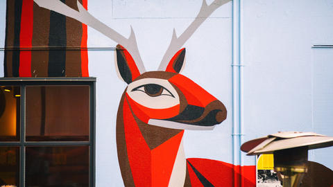 Mural of a red deer.