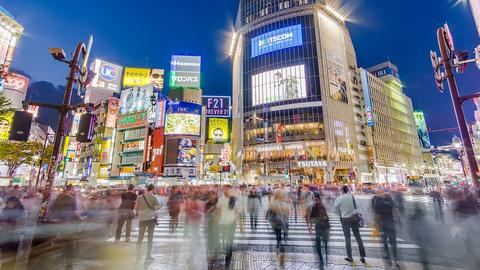 Bustling city streets at night.