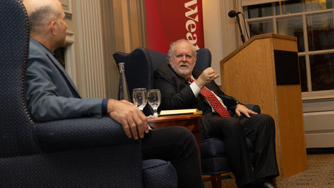 Walter Russell Mead and Erez Manela are seated in wingback chairs in conversation.