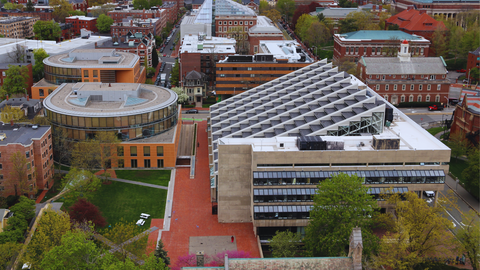 Aerial view of CGIS buildings and green.