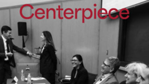 Cover of Spring 2024 Centerpiece features black and white photo of "Pernicious Prejudice" event speakers seated at a table laughing together before the event.