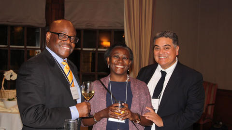 Image of former fellows at the reunion dinner