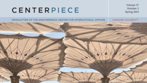 Spring 2023 Centerpiece cover with image of people praying below a bunch of white umbrellas