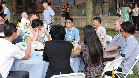 Affiliates of the Program on U.S.-Japan Relations enjoy lobster rolls at the Center's orientation BBQ