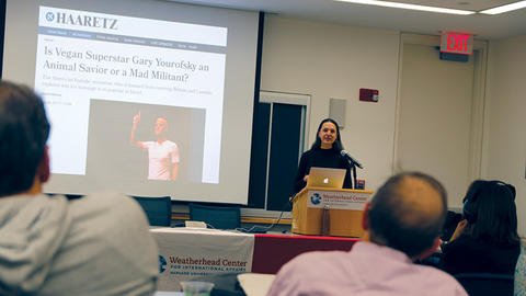 Image of Nina Gheihman speaking at the Weatherhead Forum