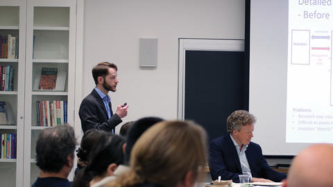 Image of Yury Kucheev speaking at the Weatherhead Forum