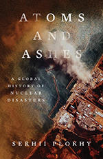 Book cover for Atoms and Ashes against photo of nuclear power plant from above