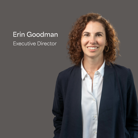 Headshot of Erin Goodman next to her name and title against gray background.