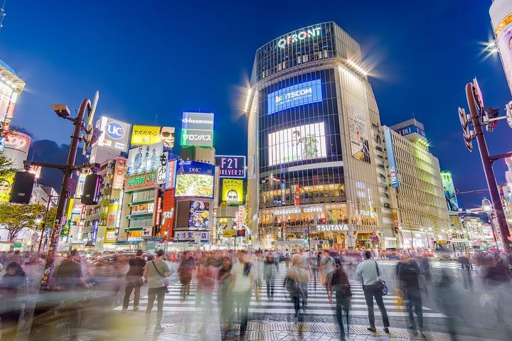 Bustling city streets at night.