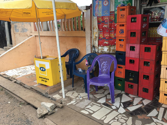 Image of plastic chairs with Adinkra symbol on them