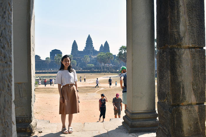 Image of Julie standing at Angkor Wat
