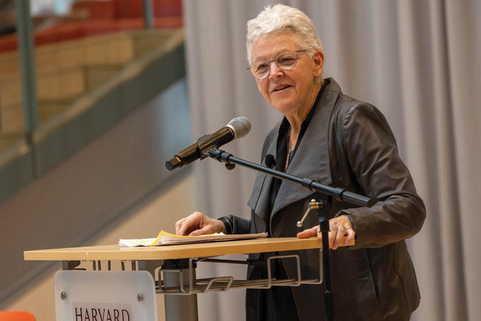 Gina McCarthy delivers lecture from podium at Smith Campus Center