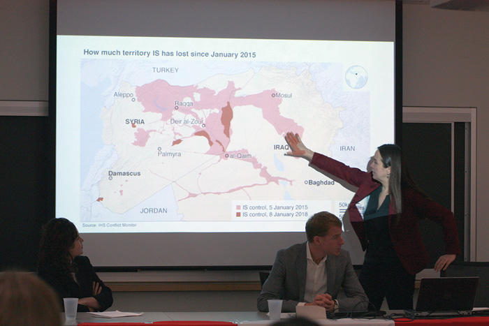Image of Amy Holmes presenting her research