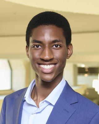Headshot of Ikenna Ogbogu.