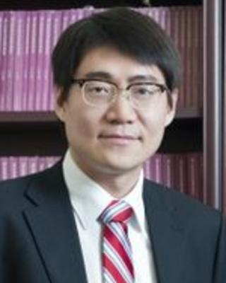 Headshot of Yuhua Wang.