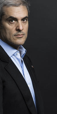 Headshot of Hicham Alaoui.