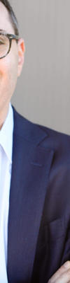 Headshot of David Battat.
