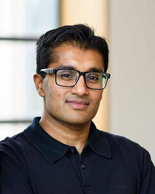 Headshot of Faisal Ahmed.