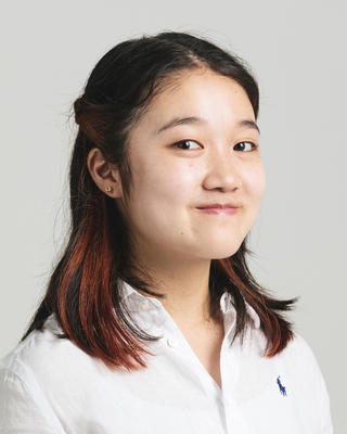 Headshot of Motoko Akiyama.