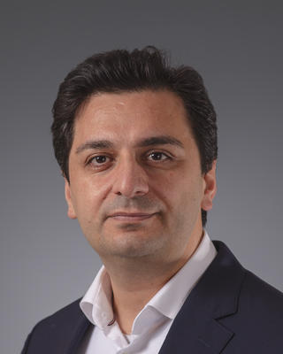 Headshot of Ebrahim Bazrafshan. 