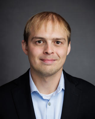Headshot of Timothy Cichanowicz.