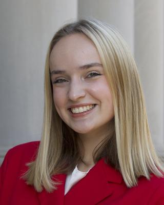 Headshot of Miruna Cioc.