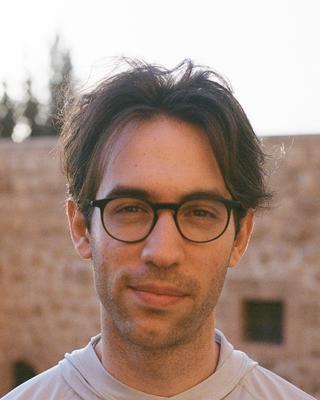 Headshot of Nathaniel Moses. 