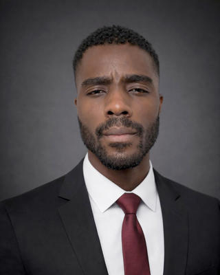 Headshot of Emmanuel Osayande. 