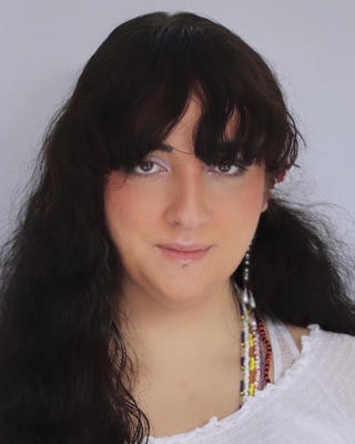 Headshot of Kaina Mendoza Price. 