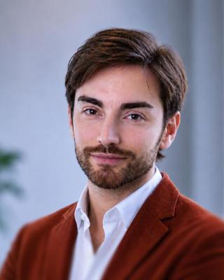 Headshot of Giovanni Santoro.