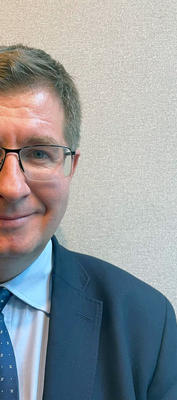 Headshot of Mateusz Stasiek.
