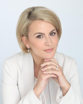 Headshot of Ilva Tare.