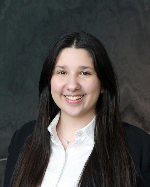 Headshot of Alin Asim