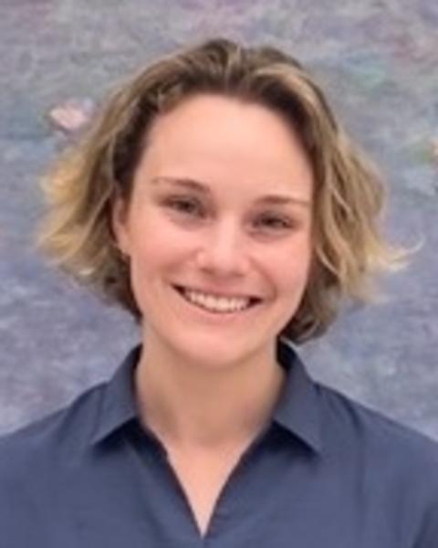 Headshot of Genevieve Dally-Watkins.