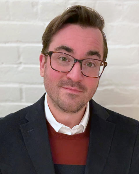 Headshot of Colin Moreshead.