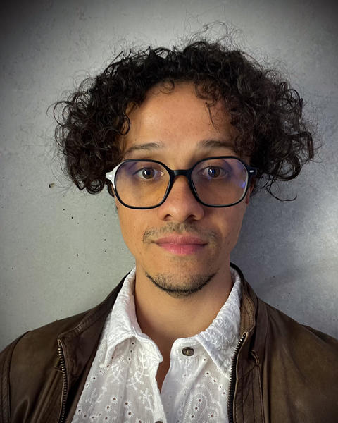 Headshot of Livio Silva-Muller.