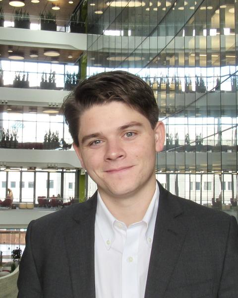 Headshot of Thomas Tait.
