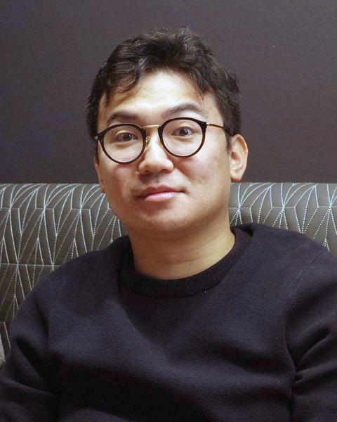 Headshot of Toshiaki Yoshida