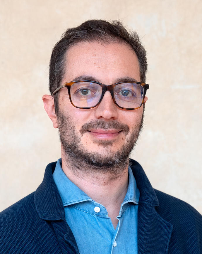 Headshot of Gianluca Busilacchi.