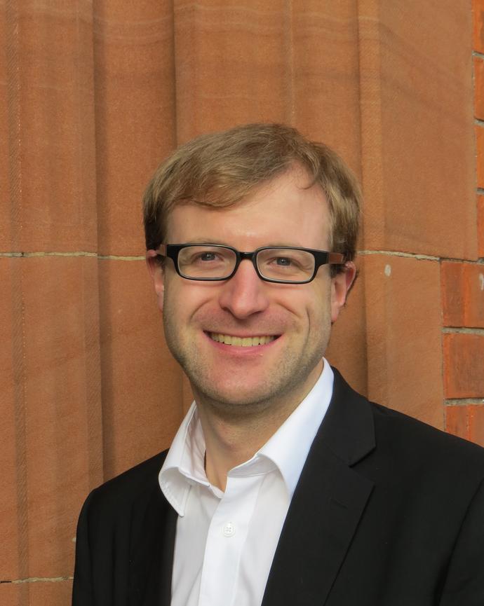 Headshot of Tobias Polzer.