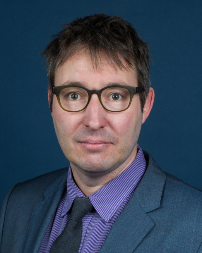 Headshot of Mathias Risse.