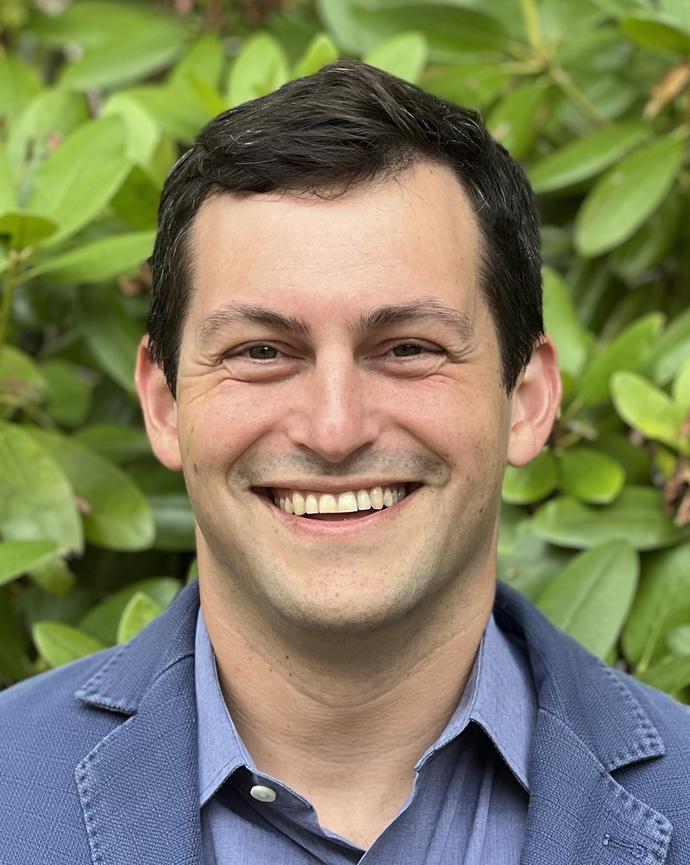 Headshot of Marc Aidinoff.