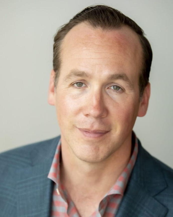 Headshot of Ryan Enos. 