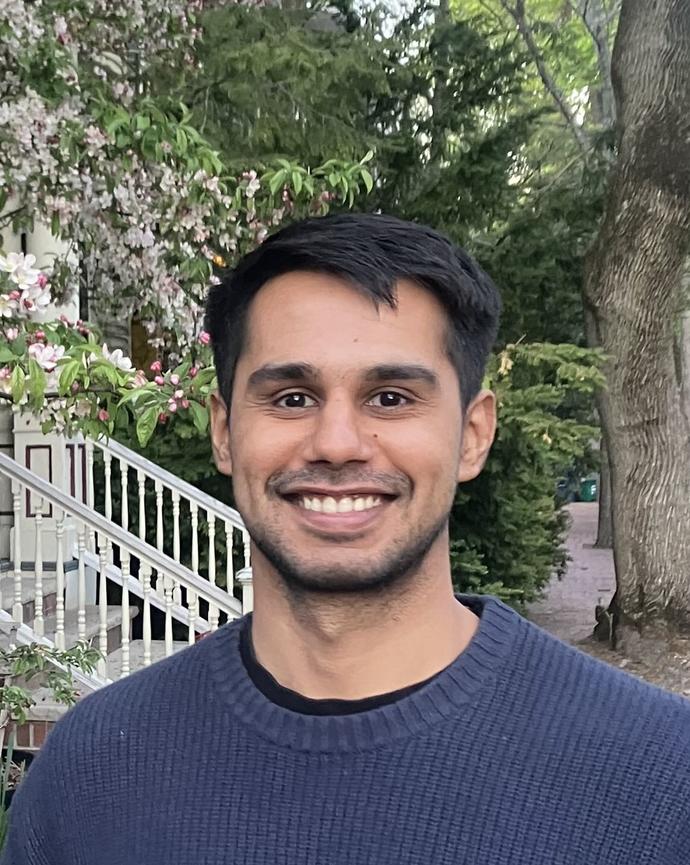 Headshot of Adil Ahsan.
