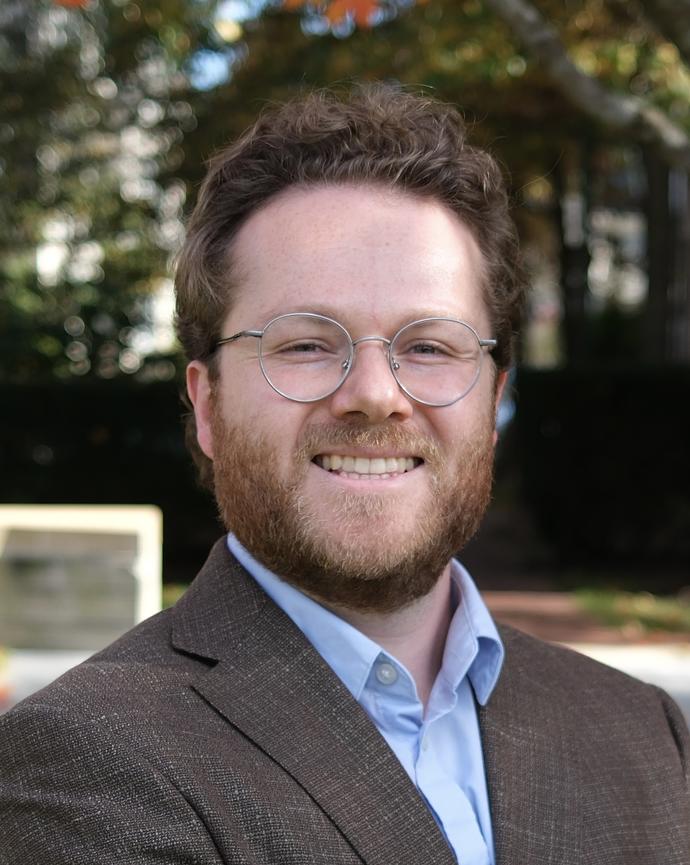 Headshot of Ethan Miles. 