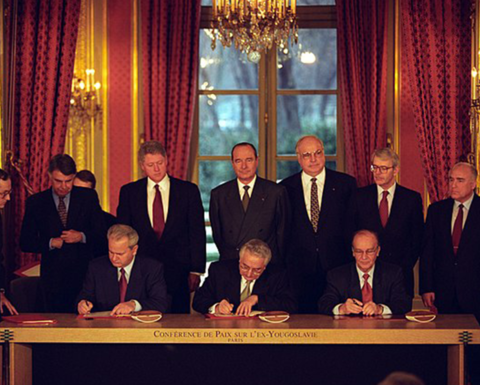 Slobodan Milošević, Alija Izetbegović, and Franjo Tuđman sign the Dayton Peace Agreement, 1995.