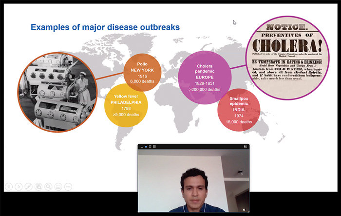 Zoom screenshot of Mario Jimenez presenting his work on disease outbreaks across the world at the Weatherhead Forum