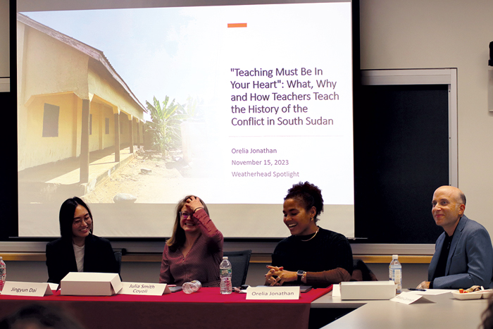 Graduate students present their research at a Weatherhead Spotlight panel.