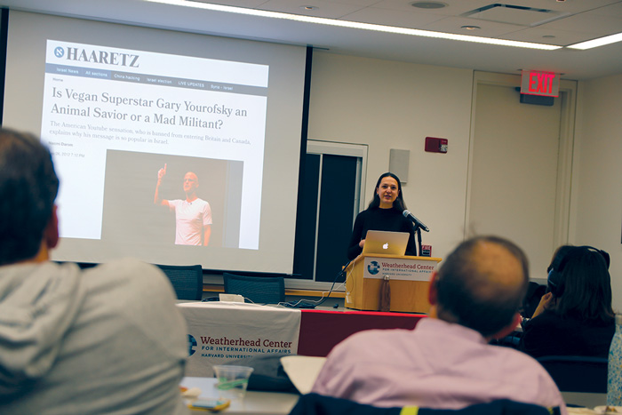 Image of Nina Gheihman speaking at the Weatherhead Forum